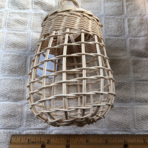 Small hand woven basket to store garlic