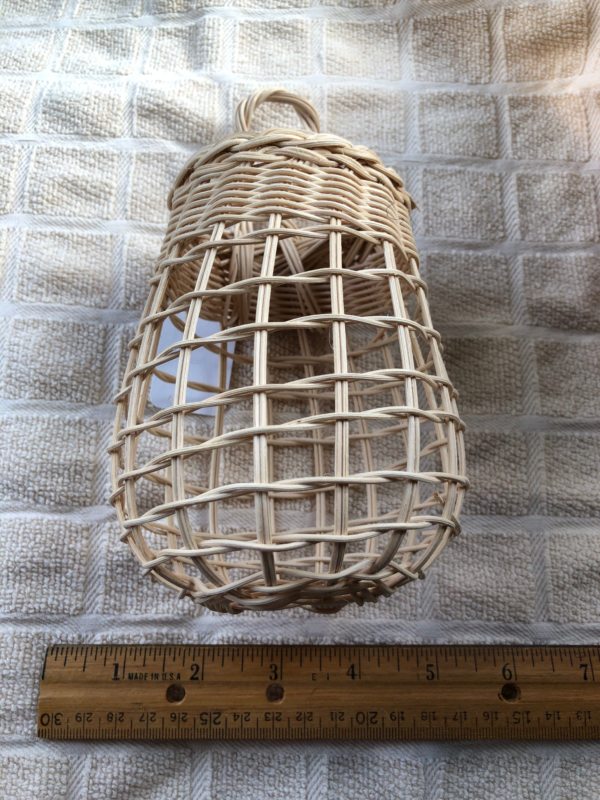 Small hand woven basket to store garlic