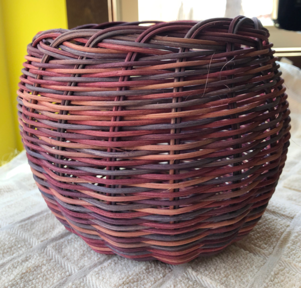 Mauve hand woven reed basket