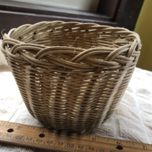 Hand woven reed basket